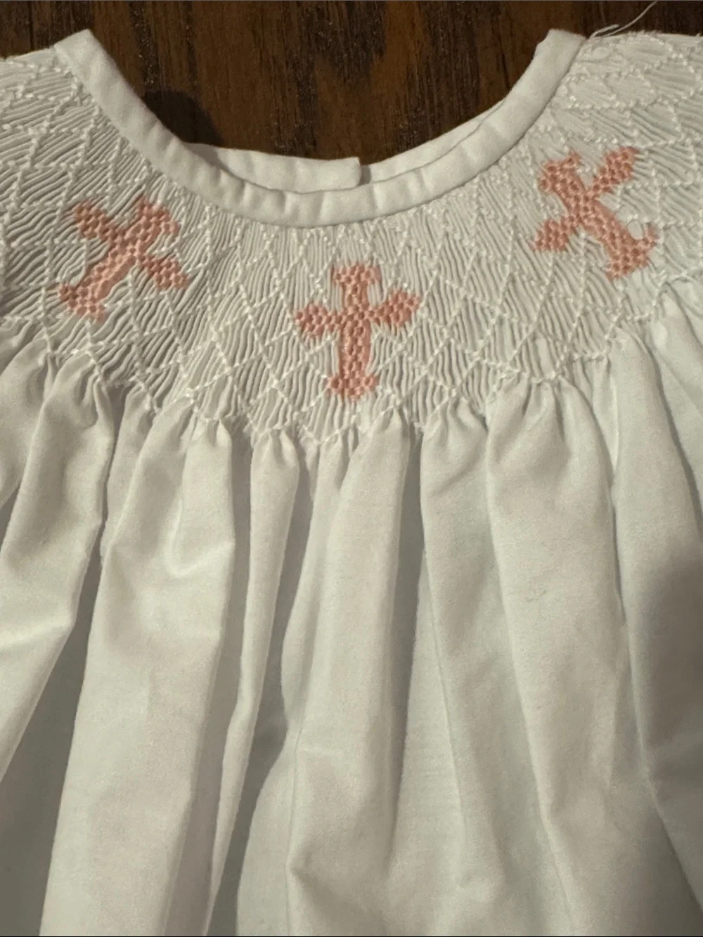 White Baby Bubble with Pink Smocked Crosses
